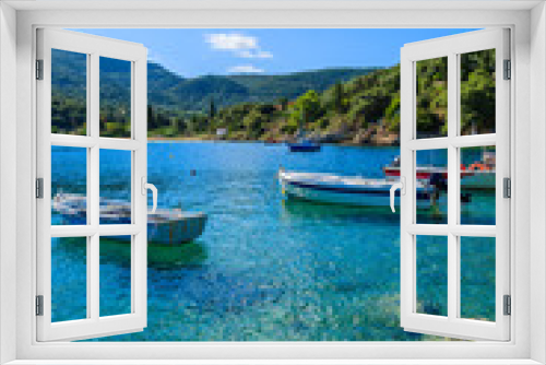 Fototapeta Naklejka Na Ścianę Okno 3D - Fishing boats on turquoise sea in mountain landscape of Kefalonia island, Greece