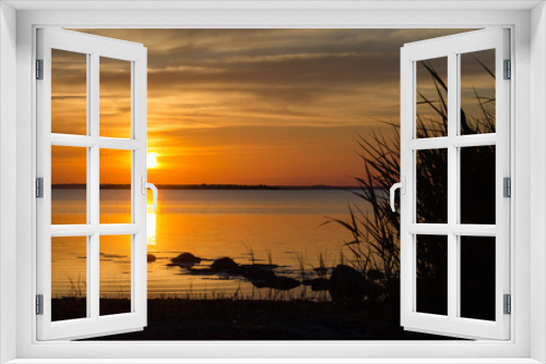 Fototapeta Naklejka Na Ścianę Okno 3D - Summer sunset by a calm coast