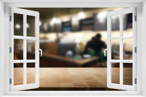 Selected focus empty brown wooden table and Coffee shop restaura