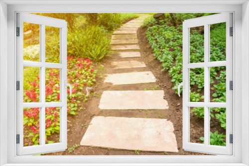 Fototapeta Naklejka Na Ścianę Okno 3D - Walkway in the flowers garden