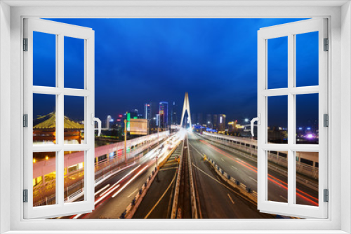 Fototapeta Naklejka Na Ścianę Okno 3D - busy traffic on bridge near downtown of chongqing at twilight