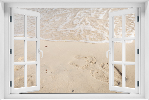 Fototapeta Naklejka Na Ścianę Okno 3D - Footprints beach background