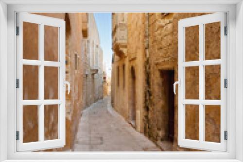 Fototapeta Naklejka Na Ścianę Okno 3D - Ancient narrow street in Mdina, old capital of Malta.