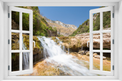 Fototapeta Naklejka Na Ścianę Okno 3D - The natural reserve Cavagrande, Sicily, with a view of a smal fall and of the canyon