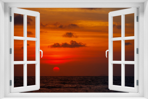Fototapeta Naklejka Na Ścianę Okno 3D - Red Ball of the Sun Dipping towards Horizon at Sunset