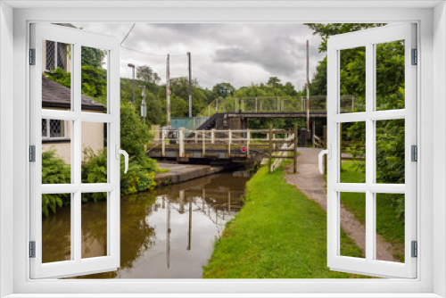 Fototapeta Naklejka Na Ścianę Okno 3D - Macclesfield, Cheshire, UK. July 25th 2016. Swing bridge over canal, Macclesfield, Cheshire, UK
