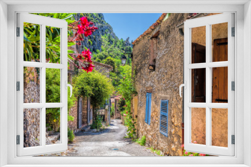 Fototapeta Naklejka Na Ścianę Okno 3D - Moustiers Sainte Marie village with street in Provence, France