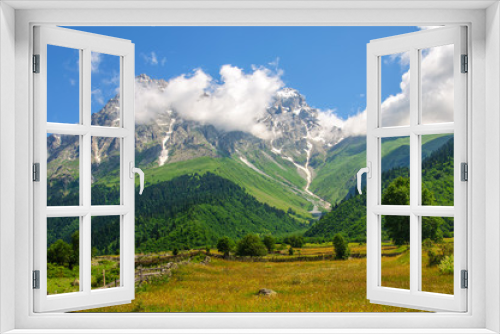 Fototapeta Naklejka Na Ścianę Okno 3D - Great view of the alpine meadows with blue sky at the foot  Mt. Ushba.