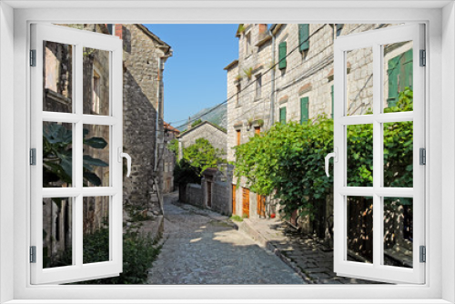 Fototapeta Naklejka Na Ścianę Okno 3D - Typical narrow street in town of Risan, Montenegro