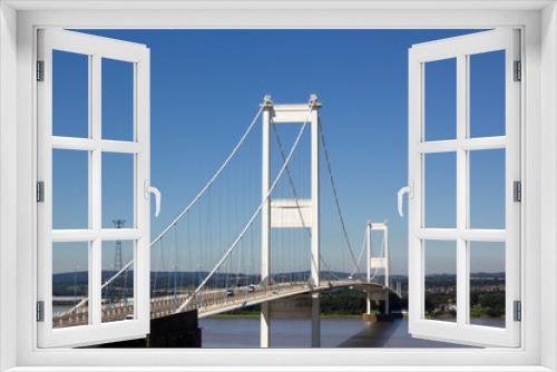 Fototapeta Naklejka Na Ścianę Okno 3D - The Severn Bridge, one of the famous motorway suspension bridges in England, spanning the River Severn and River Wye