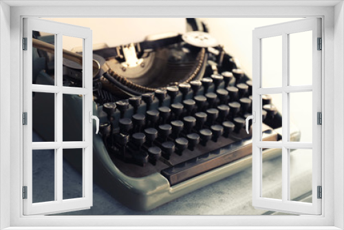 Old typewriter on the table, closeup