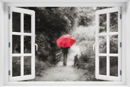 Fototapeta Naklejka Na Ścianę Okno 3D - Girl with Red Umbrella Walking Through the Forest