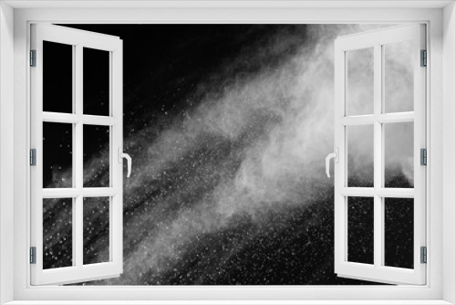Fototapeta Naklejka Na Ścianę Okno 3D - Freeze motion of white dust explosions isolated on black 