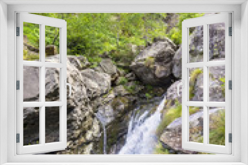 Fototapeta Naklejka Na Ścianę Okno 3D - Small stream and waterfall in the European Alps