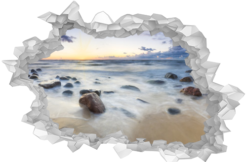 Zachód słońca nad bałtycką plażą,głazy piastowskie na wyspie Wolin

