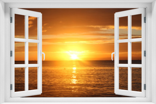 Fototapeta Naklejka Na Ścianę Okno 3D - Orange sunset over the sea.