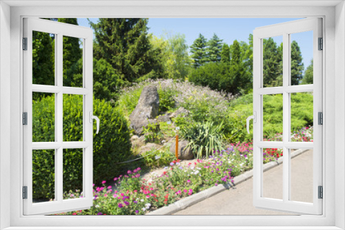 Fototapeta Naklejka Na Ścianę Okno 3D - Garden path and flowerbed