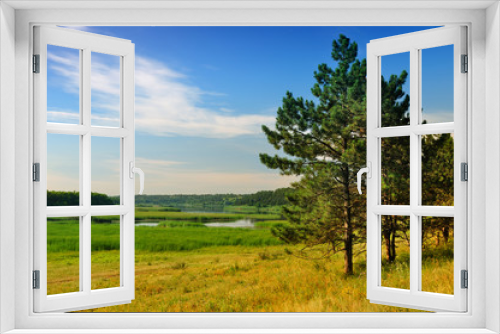 Fototapeta Naklejka Na Ścianę Okno 3D - Landscape with a pine forest and lakes