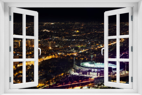 Melbourne, Australia - August 27, 2016: Aerial night view of the city and Melbourne Cricket Ground - home of Australian Football and the National Sprots Museum