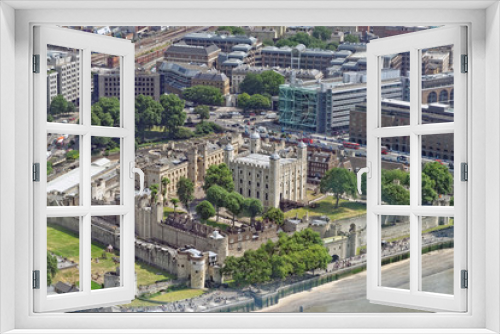 Fototapeta Naklejka Na Ścianę Okno 3D - Aerial view of Tower of London - Part of the Historic Royal Palaces, housing the Crown Jewels. UK
