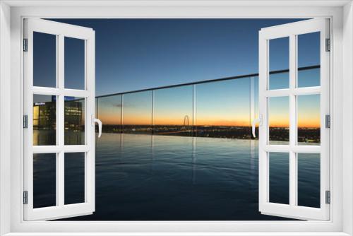 Fototapeta Naklejka Na Ścianę Okno 3D - View of infinity pool at dusk, Victory Park, Dallas, Texas, USA