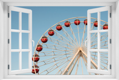 Fototapeta Naklejka Na Ścianę Okno 3D - Ferris wheel on blue sky