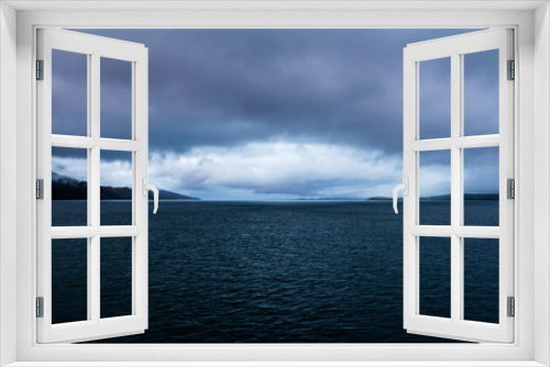 Fototapeta Naklejka Na Ścianę Okno 3D - Eye shaped storm at dusk near Mull, Scotland