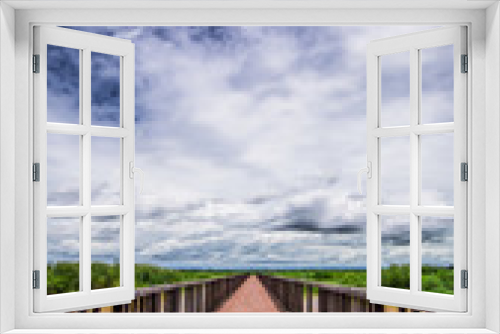 Fototapeta Naklejka Na Ścianę Okno 3D - wooden bridge and blue sky.