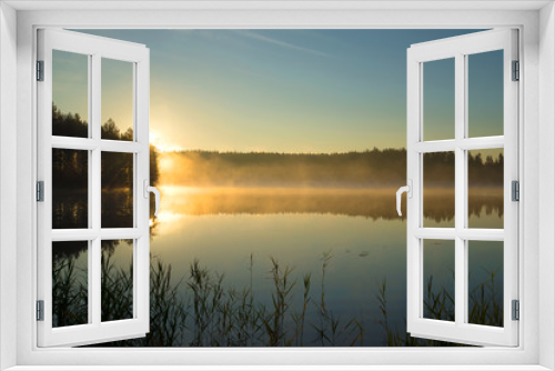 Fototapeta Naklejka Na Ścianę Okno 3D - Sunrise on forest lake on a summer morning. Finland