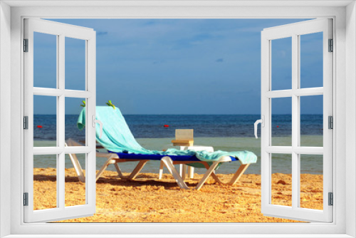 Fototapeta Naklejka Na Ścianę Okno 3D - sun chair on the sandy beach 