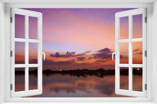Fototapeta Naklejka Na Ścianę Okno 3D - Twilight sky after sunset with water reflect landscape	