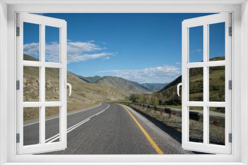 Fototapeta Naklejka Na Ścianę Okno 3D - Asphalt winding road in the mountainous area in the summer