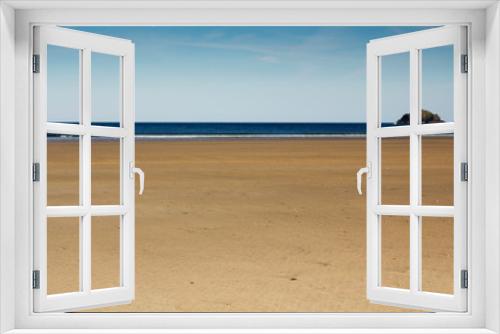 Fototapeta Naklejka Na Ścianę Okno 3D - View over the beach at Polzeath in Cornwall