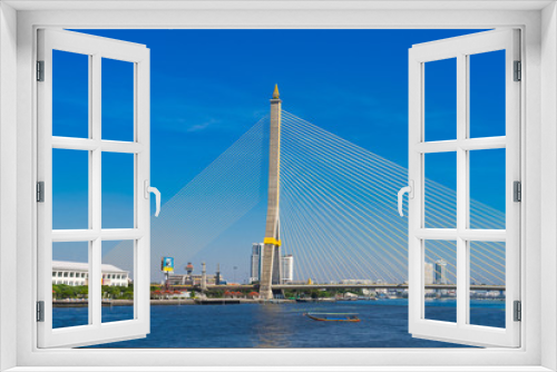 Fototapeta Naklejka Na Ścianę Okno 3D - The Rama VIII bridge over the Chao Praya river in Bangkok, Thailand