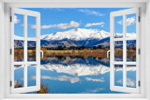 Fototapeta Naklejka Na Ścianę Okno 3D - Reflection of snowy mountains near Fairlie, New Zealand