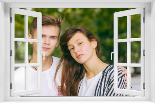 Romantic couple together in a park in autumn