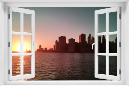 Fototapeta Naklejka Na Ścianę Okno 3D - Sunset over NYC skyline