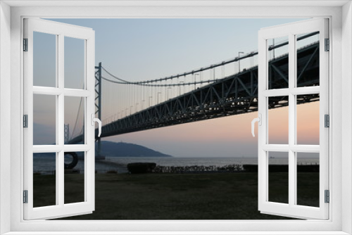 Fototapeta Naklejka Na Ścianę Okno 3D - 明石海峡大橋と夕日
