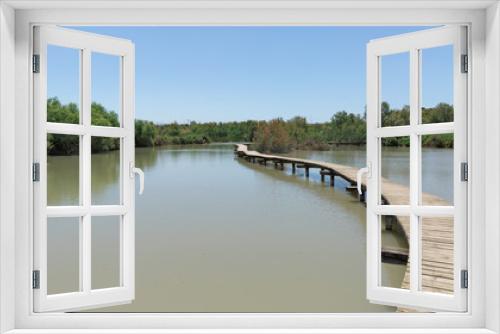 Fototapeta Naklejka Na Ścianę Okno 3D - Wooden path to the pond