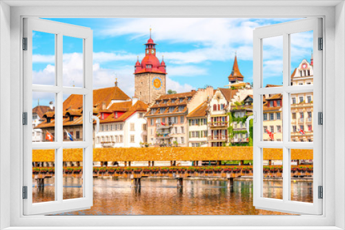 Fototapeta Naklejka Na Ścianę Okno 3D - View on the riverside with city hall and old wooden bridge in Lucerne old town in Switzerland