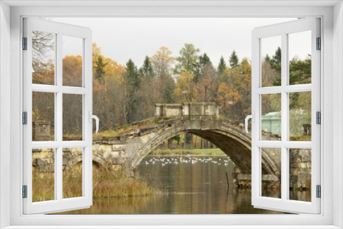 Fototapeta Naklejka Na Ścianę Okno 3D - Ancient bridge on the lake.