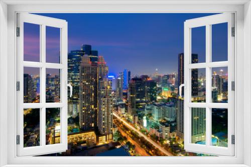 Fototapeta Naklejka Na Ścianę Okno 3D - Bangkok night view with skyscraper in Sathon Silom, Thailand