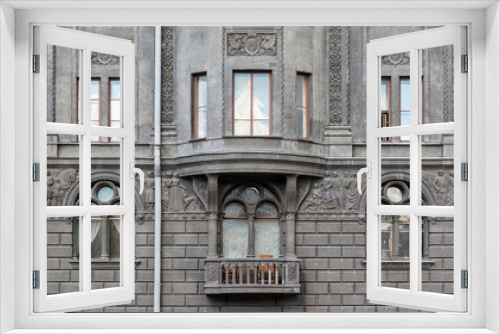 Fototapeta Naklejka Na Ścianę Okno 3D - Several windows in a row and balcony on facade of urban apartment building front view, St. Petersburg, Russia.