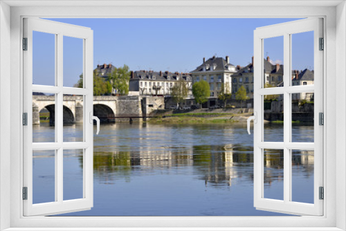 Fototapeta Naklejka Na Ścianę Okno 3D - Loire river and Cessart bridge at Saumur, commune in the Maine-et-Loire department , Pays de la Loire region in western France.