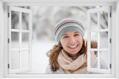 Attractive young woman in wintertime outdoor