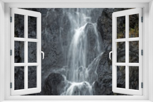 Fototapeta Naklejka Na Ścianę Okno 3D - Close-up of flowing water at a waterfall