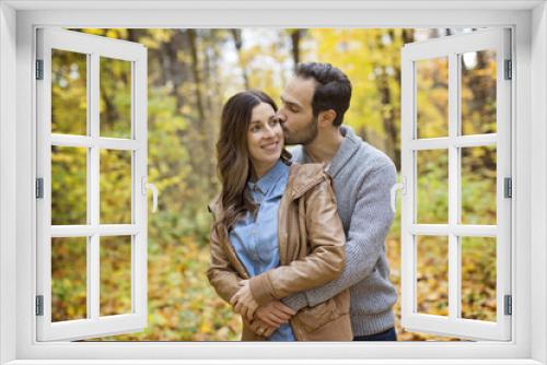 Nice couple having fun in autumn park