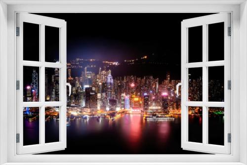 Fototapeta Naklejka Na Ścianę Okno 3D - Night aerial view panorama of Hong Kong skyline and Victoria Harbor. Travel destinations