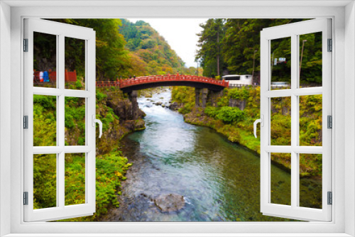 Fototapeta Naklejka Na Ścianę Okno 3D - The red Shinkyo Sacred Bridge in autumn, the main way to the Fut