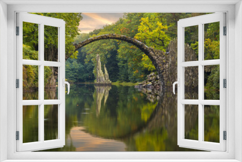 Fototapeta Naklejka Na Ścianę Okno 3D - Autumn over Devil's bridge in the park Kromlau, Germany
